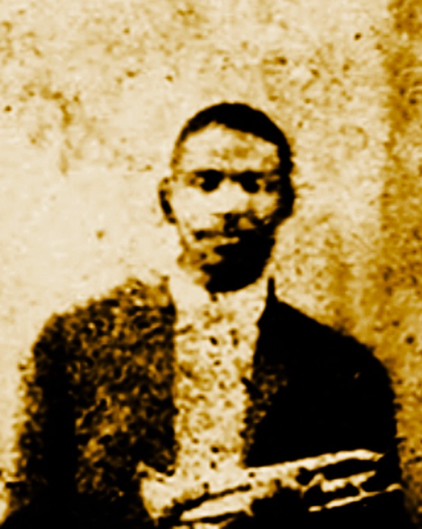 Buddy Bolden holding his cornet, from the only known photograph of him, around 1905.